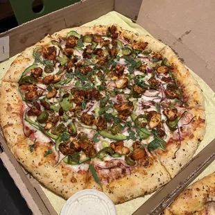 Hyderabad Spicy Chicken Pizza with a side of ranch