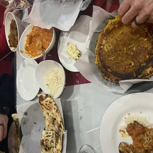 Chickpea roti, garlic naan, onion basil naan, lamb jalfrezy garlic, chicken, tiki masala, mushroom masala
