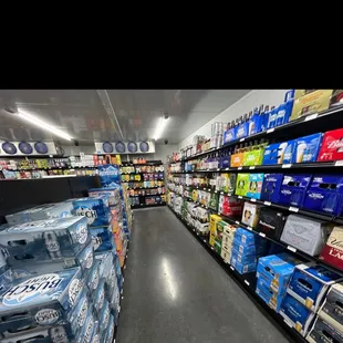 the aisle of a liquor store