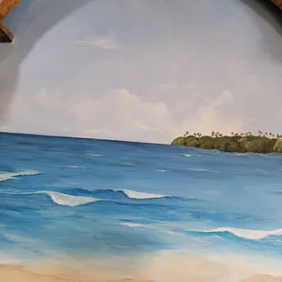 Beautiful wall mural in the restaurant  dining area.