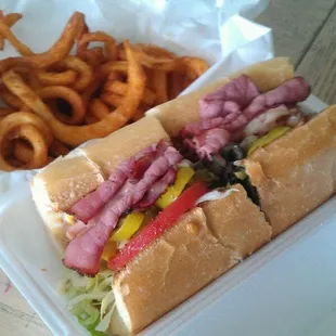 Hot pastrami with provolone and curly fries.