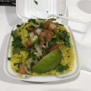 Deli Deluxe- poha. Flattened rice