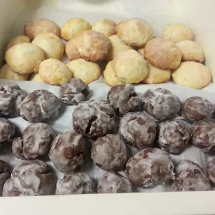 a tray of doughnuts and other pastries