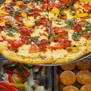 margarita pizza in top pic and sausage with peppers and onions bottom left and arancin on the right (aka rice balls)