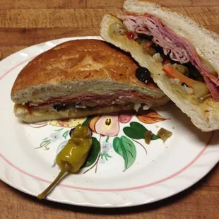 a cut in half sandwich on a plate