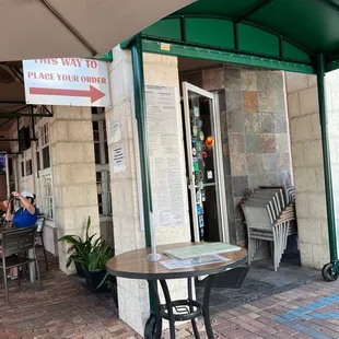 a table and chairs outside