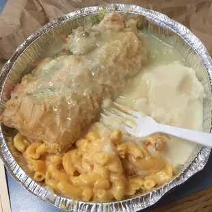 Chicken pot pie with mashed potato with gravy and Mac and cheese.
