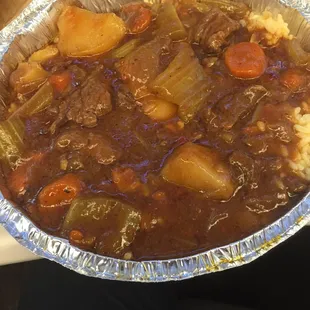 Beef stew over rice ~$8.50