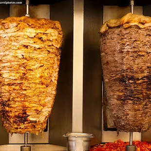 two kebabs being cooked