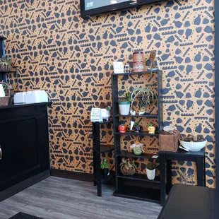 a kitchen with a leopard print wallpaper