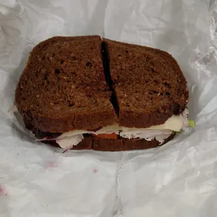The carved turkey cranberry on pumpernickel sandwich. Thanksgiving all year around.