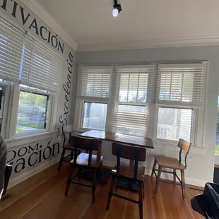 Other side of dining area about 4 tables inside and 2 outside on the porch