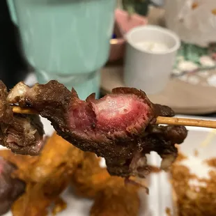 meat skewered on skewers
