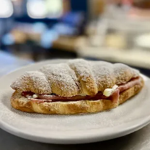 Oven-baked Monte Cristo with ham &amp; brie on a croissant. Melty, crispy perfection!