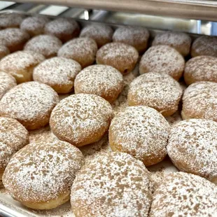 Mini-beignet with hazelnut filling: Rich, nutty sweetness in every soft, pillowy bite.