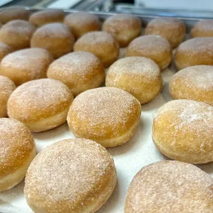 Sugar beignet: A mini treat dusted with sweetness, perfect in its simplicity.