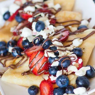 strawberries, blueberries, and goat cheese