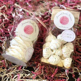 two bags of white chocolate covered with sprinkles