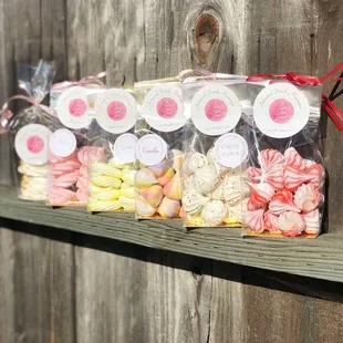 a display of sweets on a wooden fence