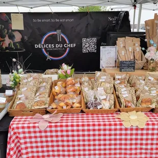 A collection of lots of delicious pastries and French breads..