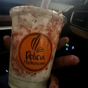 Elote with flaming Hot Cheetos.