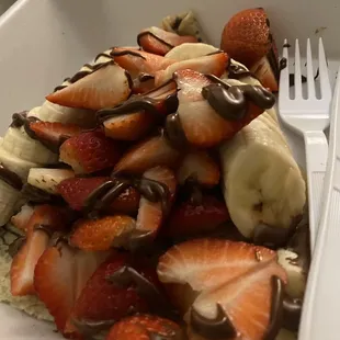 Nutella Crepe added strawberries  and banana