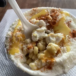 Delicious esquites!! Fresh corn cut off the cob right in front of you