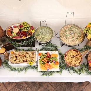 Buffet style setup with added decor for themed bridal shower