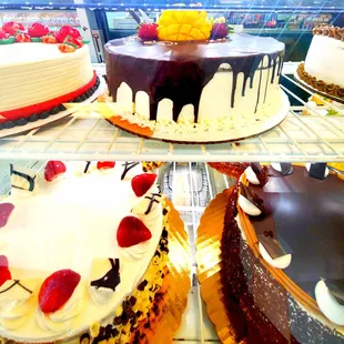 a variety of cakes on display