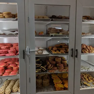 a display of cookies and pastries