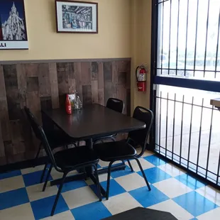 a table and chairs in a restaurant