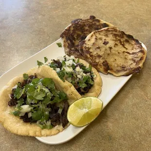 Steak tacos.  Pork/bean/cheese pupusas.