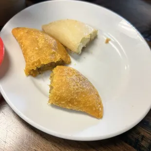 Beef and Queso empanadas. Each was approximately 2 bites each.