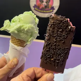 two ice cream cones with chocolate sprinkles