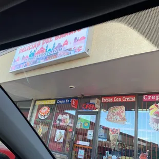 a view of the outside of a restaurant