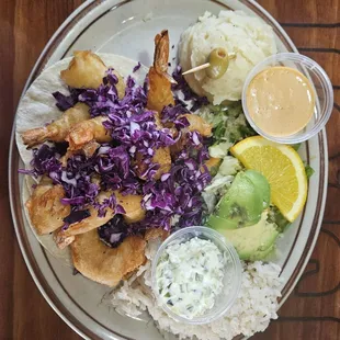 Shrimp Tacos with Mash Potatos, Rice, Avocado, Cole Slaw and Chipotle Sauce