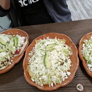 Left to right sopes, empanadas, and tacos