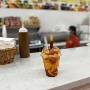 a plastic cup on a counter