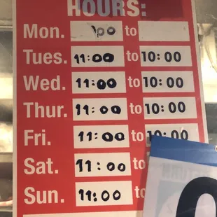a business hours sign