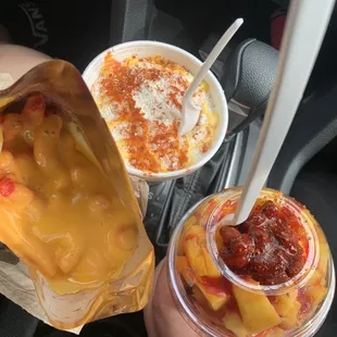 Hot Cheetos with nacho cheese , corn in the cup &amp; mangonada