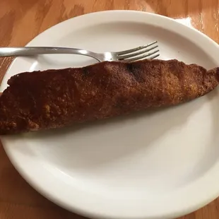 Alcapurria, I mean.. no English description for this, I would say that it is very meaty and delicious, One of my favorite street food.