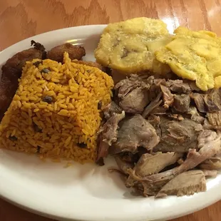 Arroz con Gandules, Roasted Pork, Tostones and Maduros