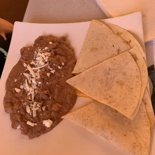 Cheese Quesadilla (appetizer menu) with a side of beans