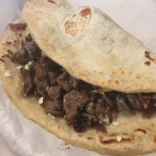 Baleada de carne -- awesome flour tortilla STUFFED with steak, avacado and egg