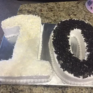a cake with a number one on it
