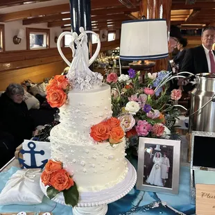Our two-tier white with strawberry filled, wedding cake. It was amazing!