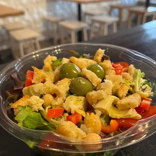 Mediterranean Salad with Greens, Garbanzo Beans, Red Bell Peppers, Artichoke Hearts, Olives and Focaccia Croutons