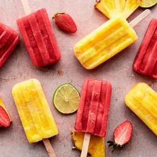 a variety of fruit pops