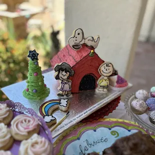 a doghouse and cupcakes