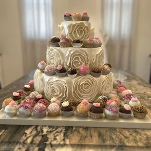 a cake and cupcakes